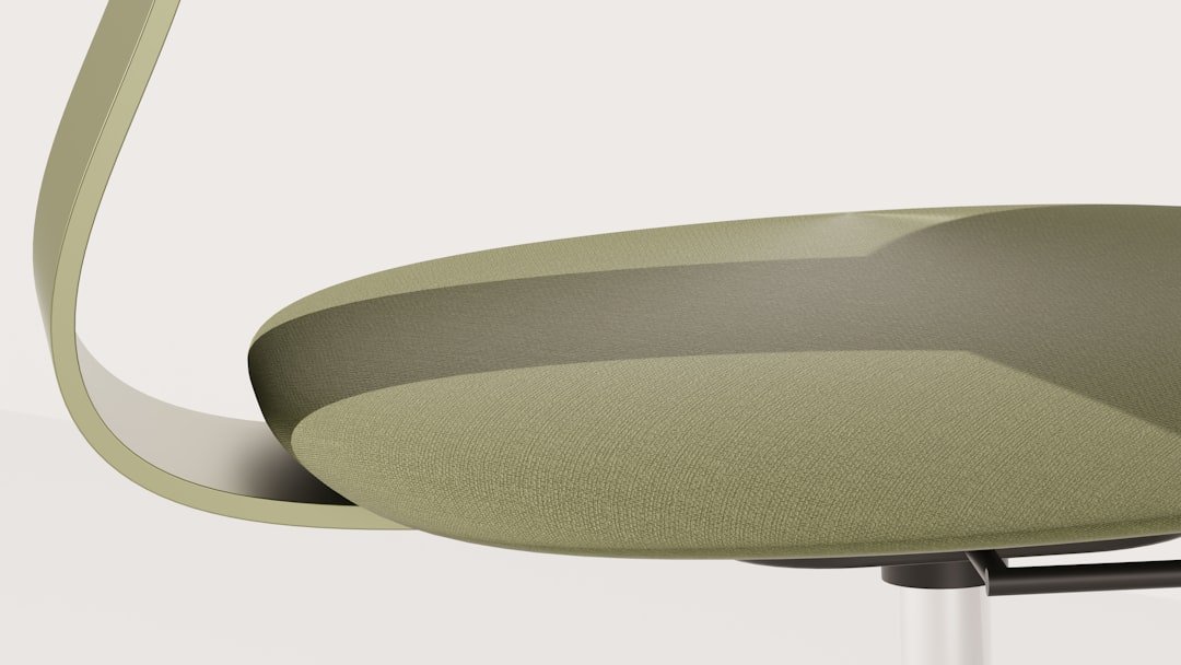 Close-up of a modern, green and white chair