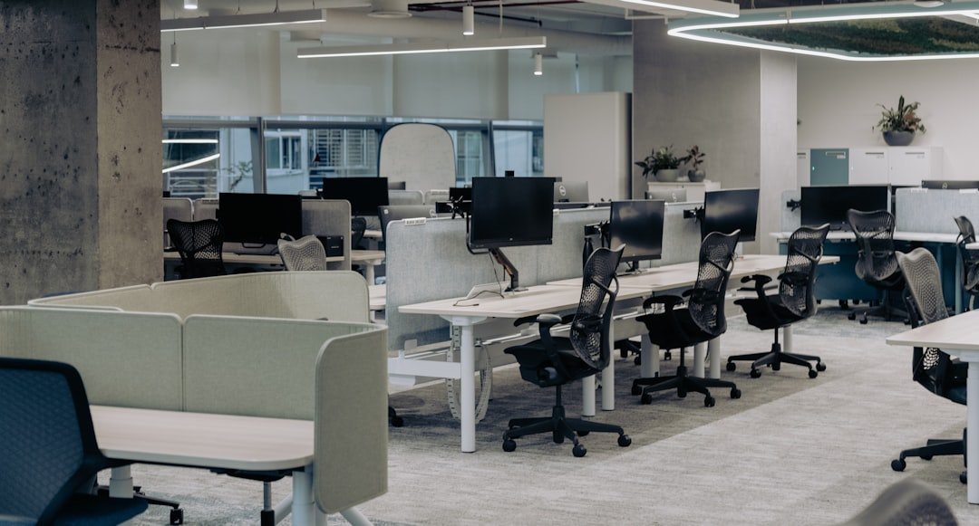 An office with a lot of desks and chairs