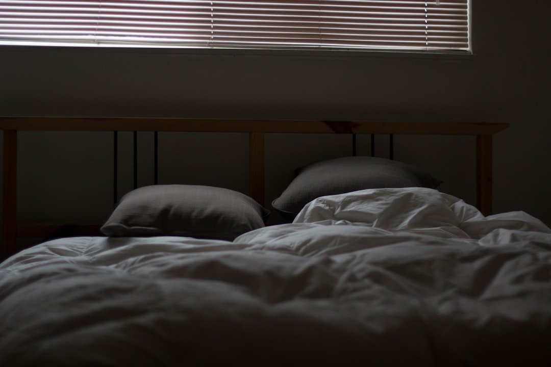 Empty white and gray bed set