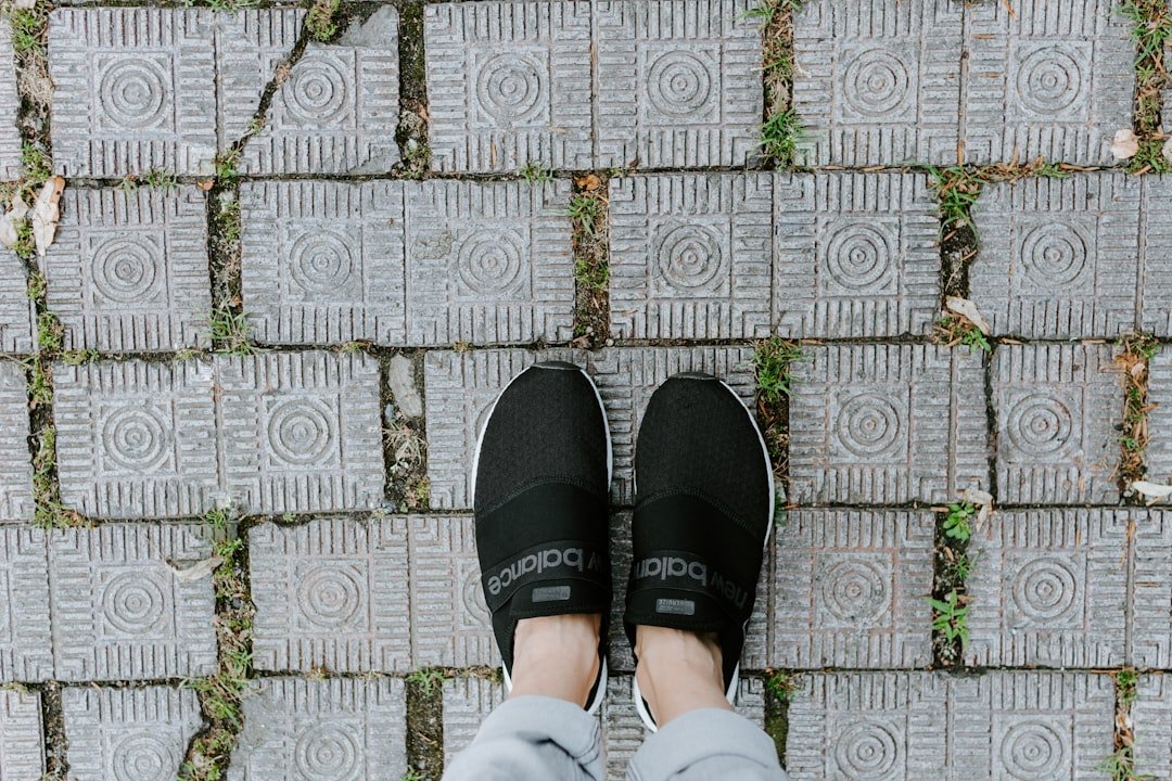 Black adidas slip ons