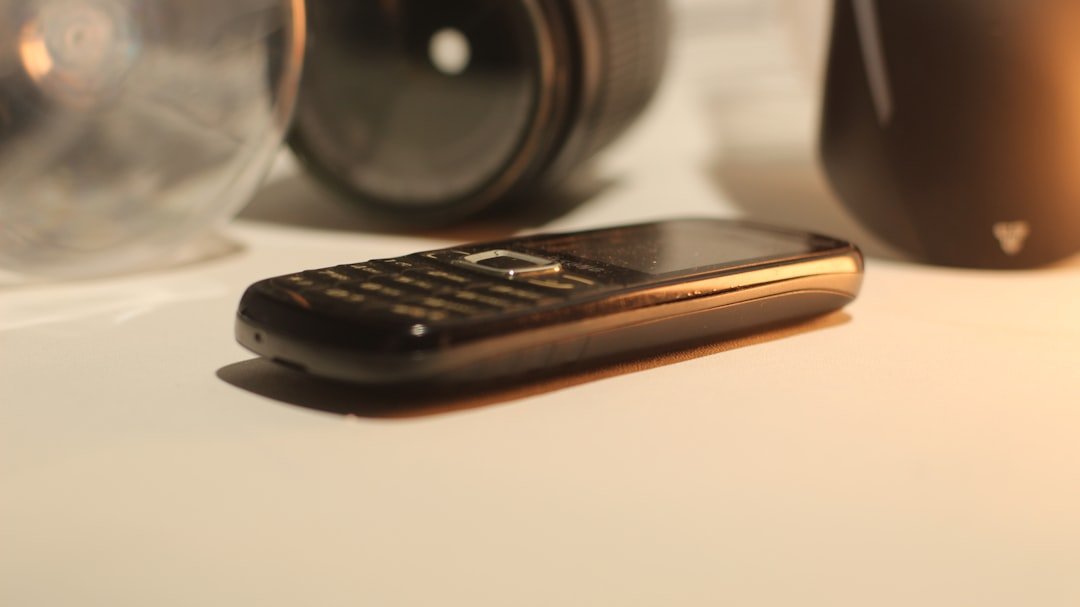 Dumbphone: A cell phone sitting on top of a table