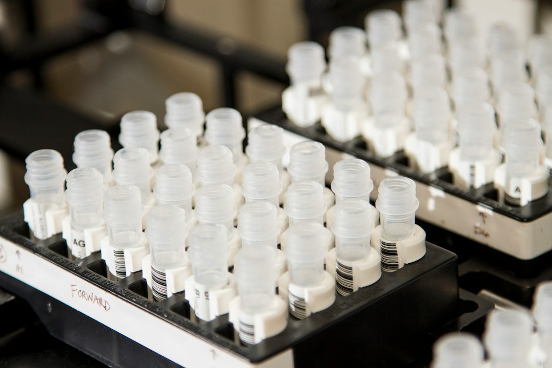 Shallow focus photography of white bottle lot