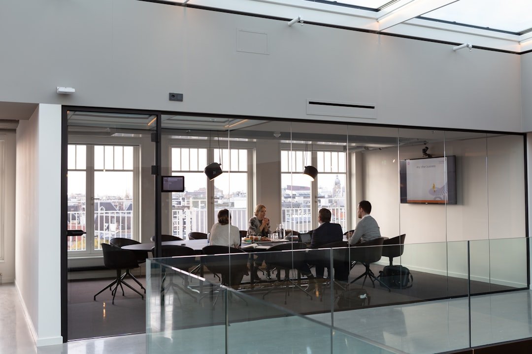 People sitting on chair inside building