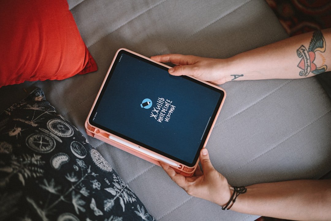 Reading on a screen: A person holding a tablet