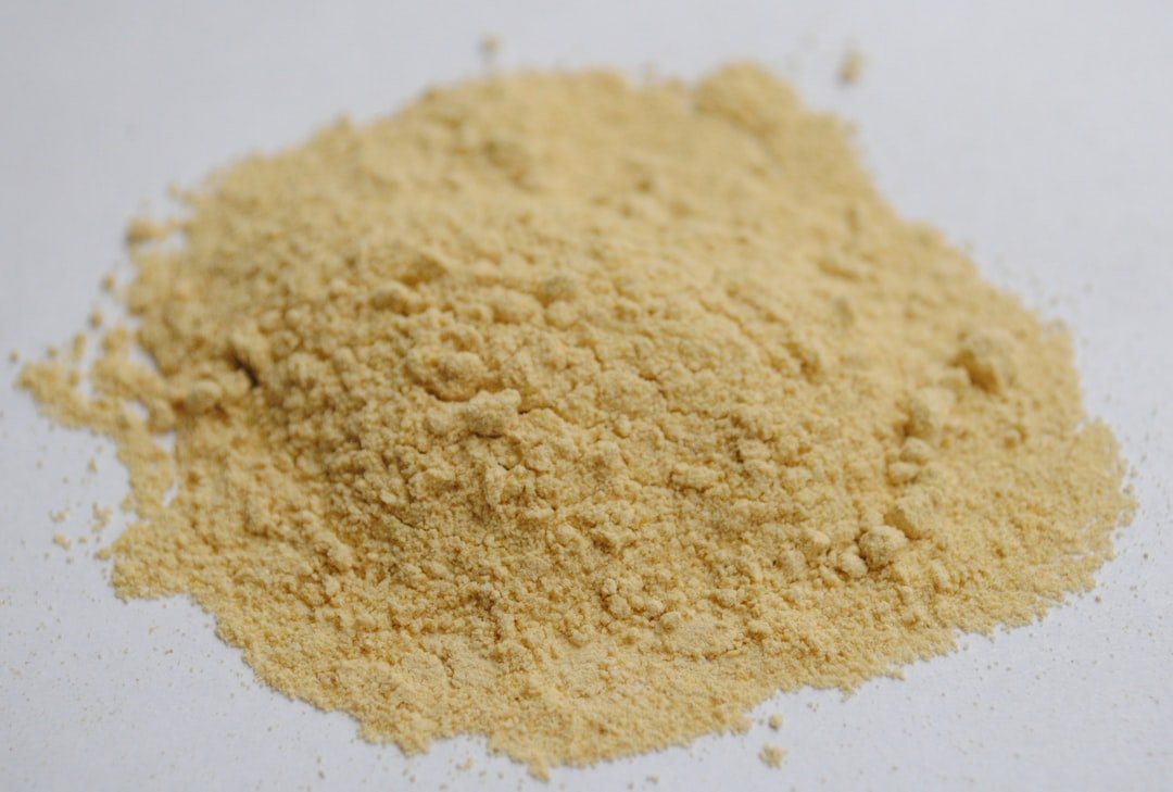 Brown powder on white surface