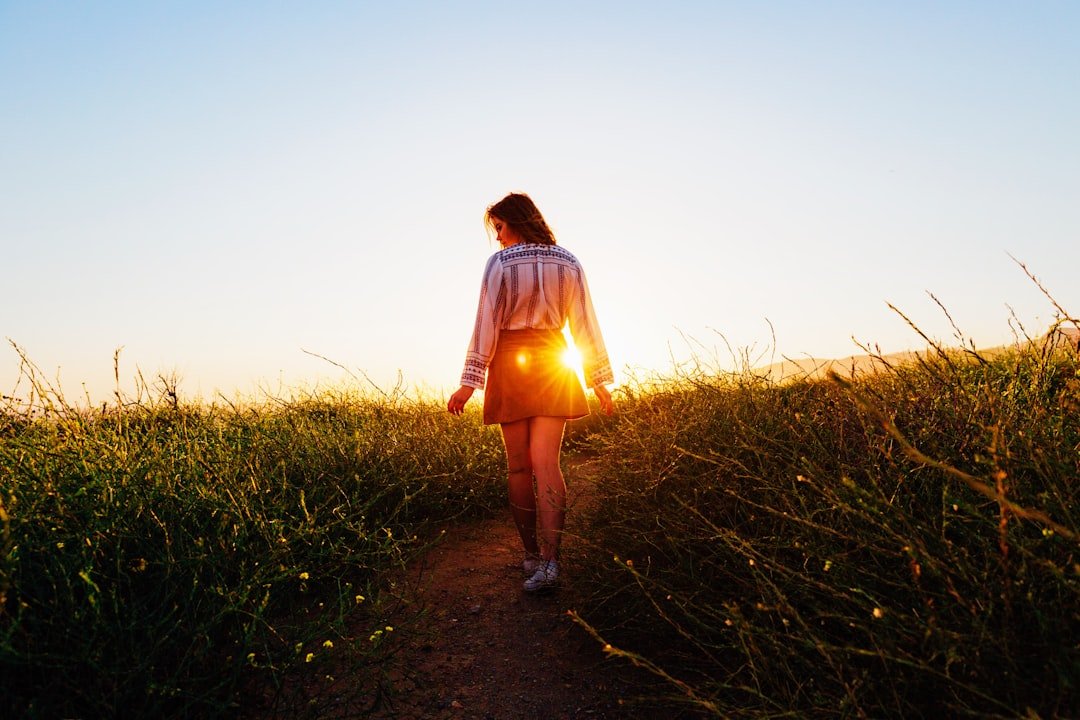Woman walking on pathway