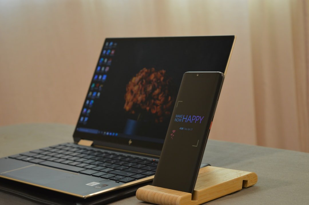 Black and silver laptop computer