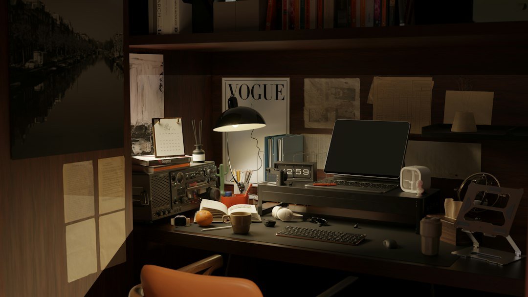 A desk with a computer and a lamp on it